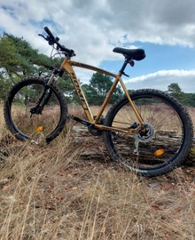 Gloednieuwe Mountainbike + Helm 